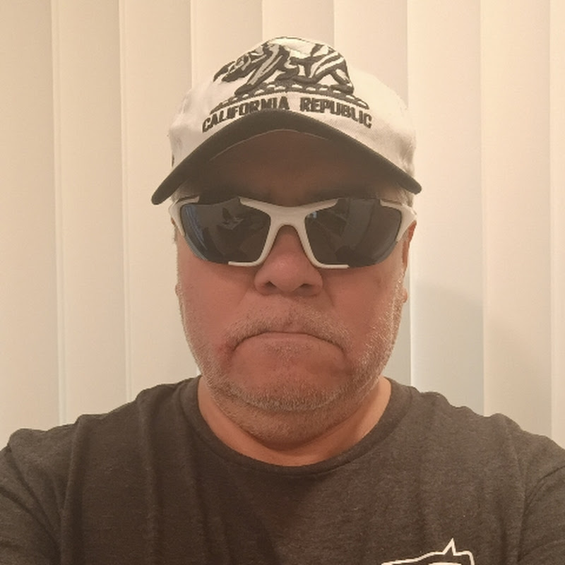 Kennedy sanroman Ábrego Logo