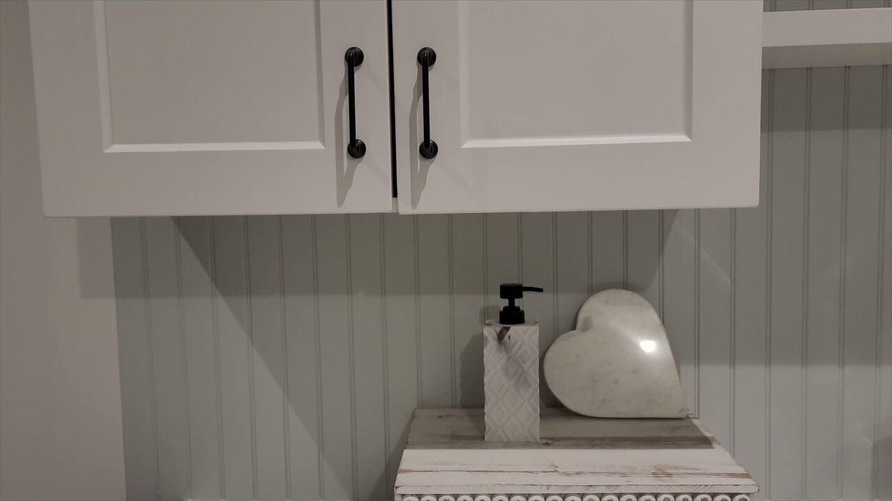 'Video thumbnail for She hated her old kitchen cabinets - see her $14 transformation!'