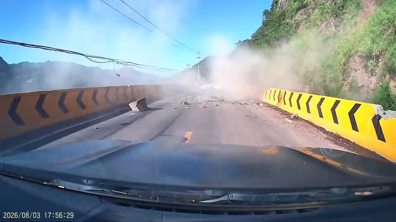 Video thumbnail for China: Chinese driver watches car ahead get crushed by falling rock on mountain road.