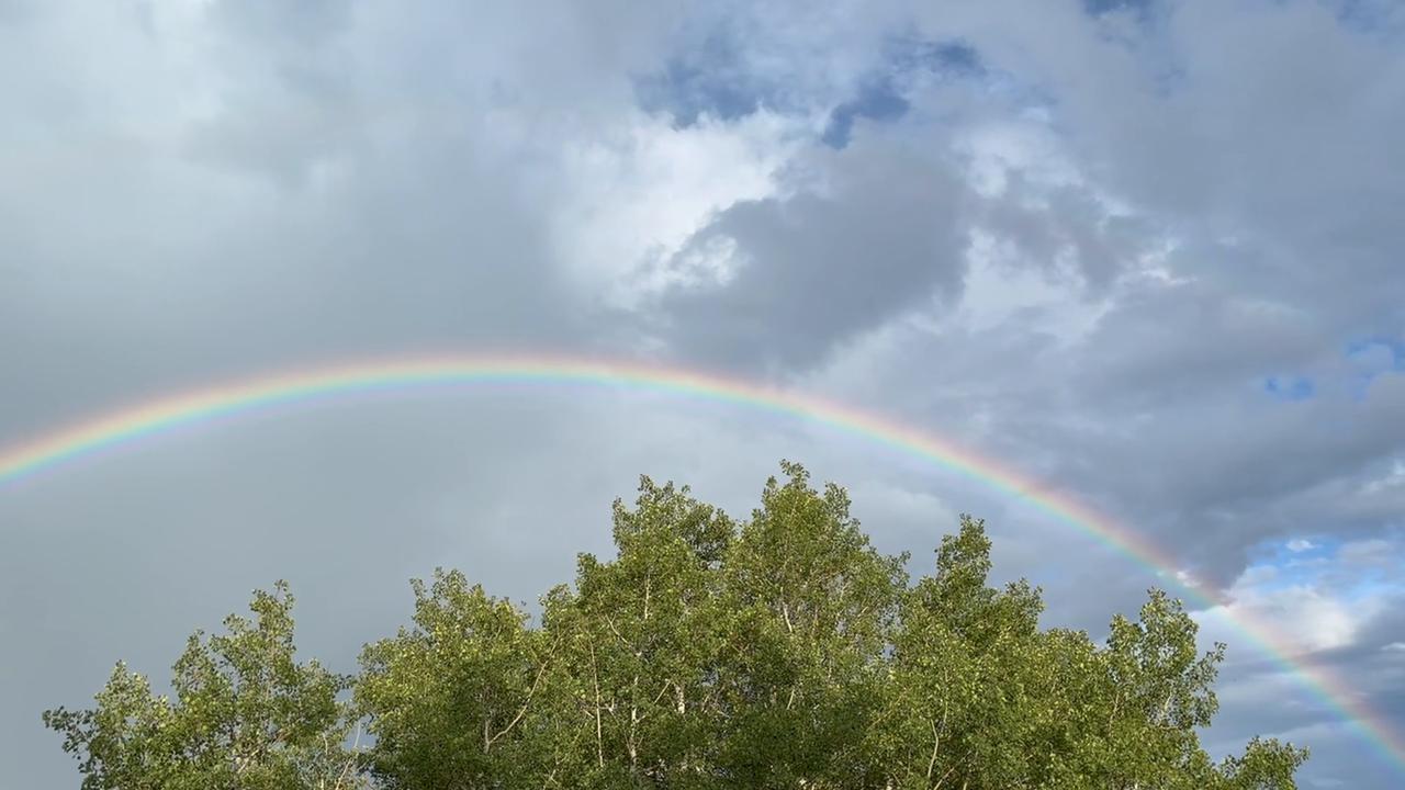 Video thumbnail for US: Rainbow Appears Over Storm Clouds After Days of Severe Weather in Evergreen, CO.