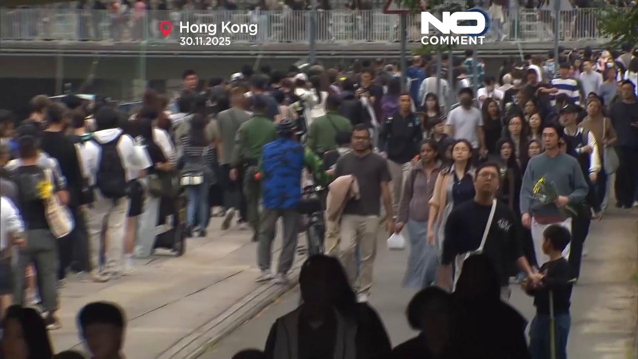 Video thumbnail for Hong Kong mourners queue to pay respects after deadly Tai Po fire