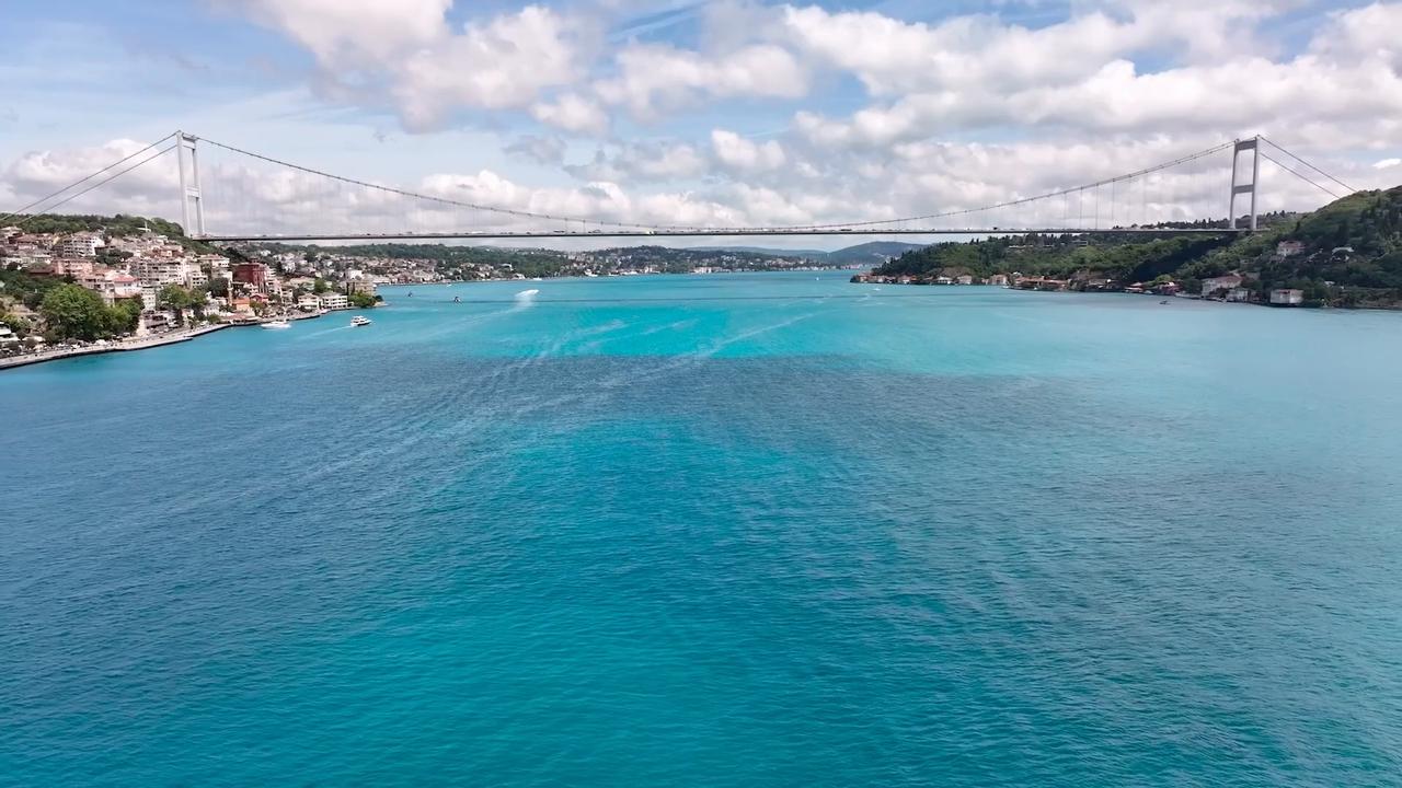 Video thumbnail for Türkiye: DRONE – Istanbul’s Bosphorus shines turquoise, fascinating residents.