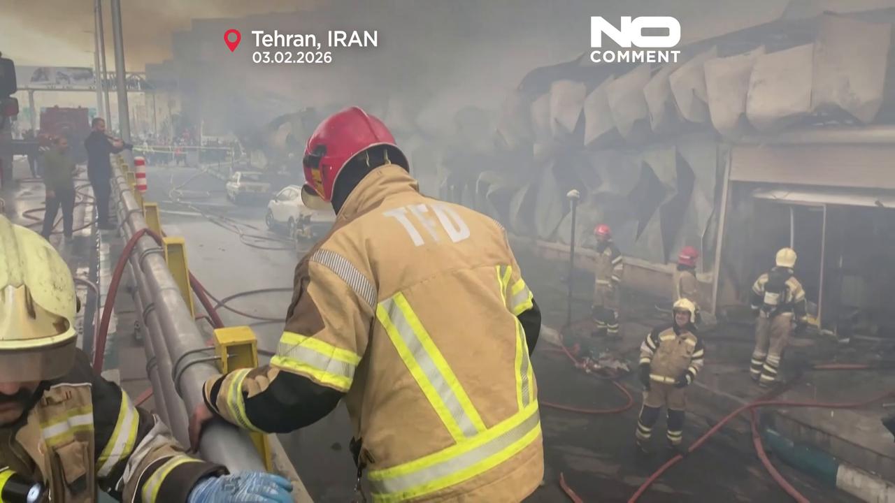 Video thumbnail for Iran: Tehran market blaze sends huge smoke plumes over city traffic