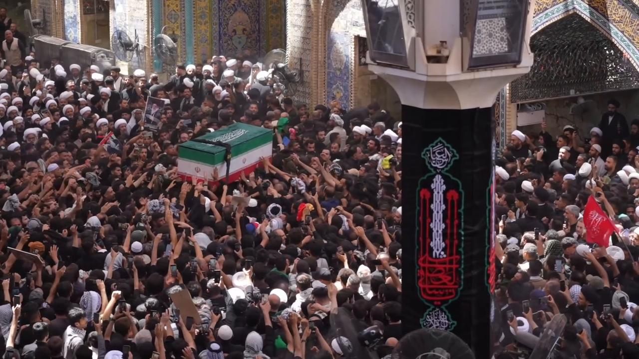 Video thumbnail for Iraq: Thousands gather in Iraq for funeral procession of slain Iranian leader Khamenei (4).