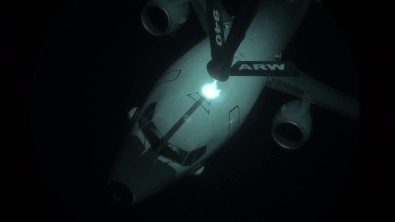Video thumbnail for Iran: U.S. Aircraft Perform Midair Refueling In Dark Skies Over Middle East.