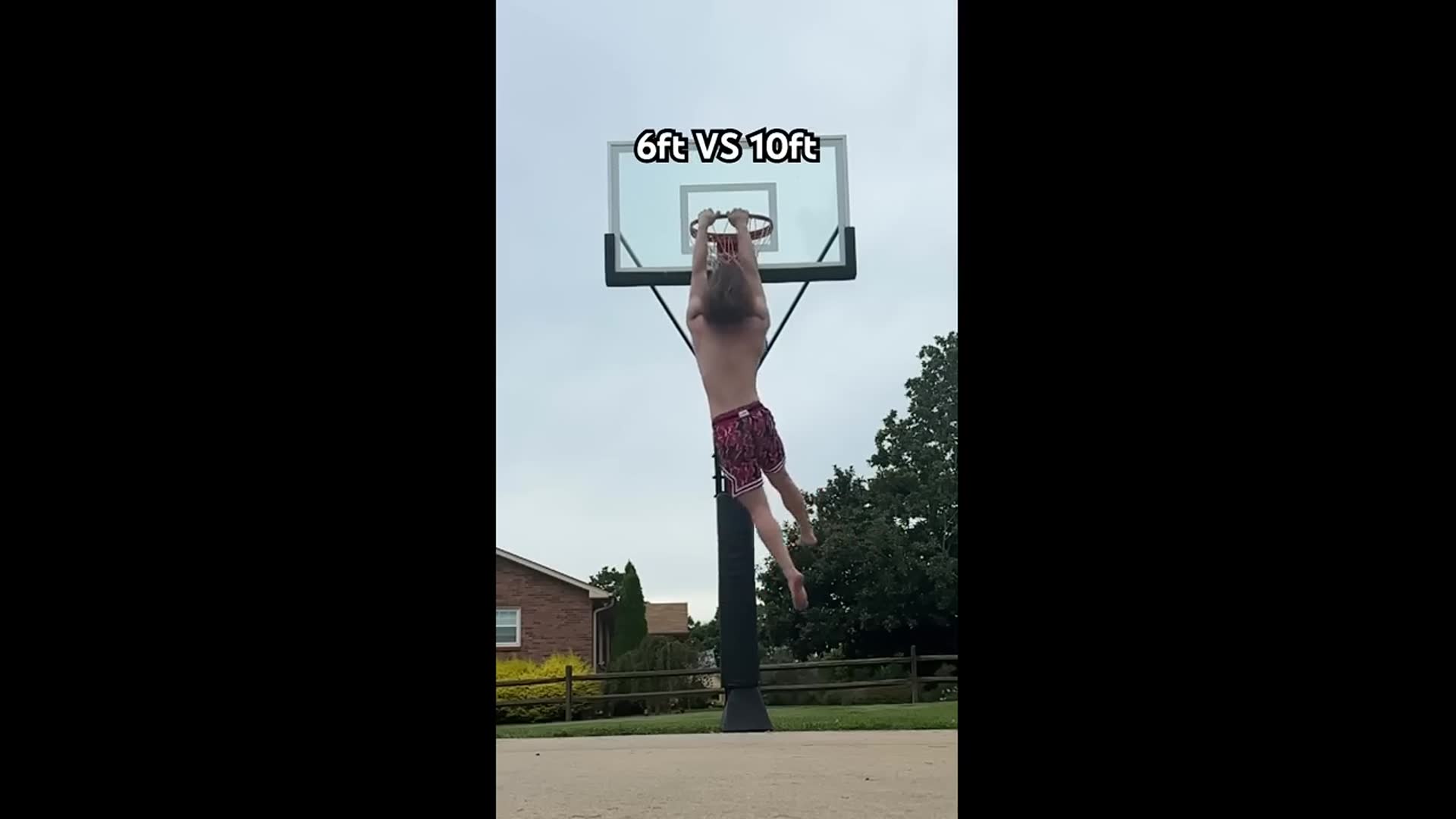 'Video thumbnail for Travis Reynolds: 6ft man barefoot dunks on 10ft rim!'