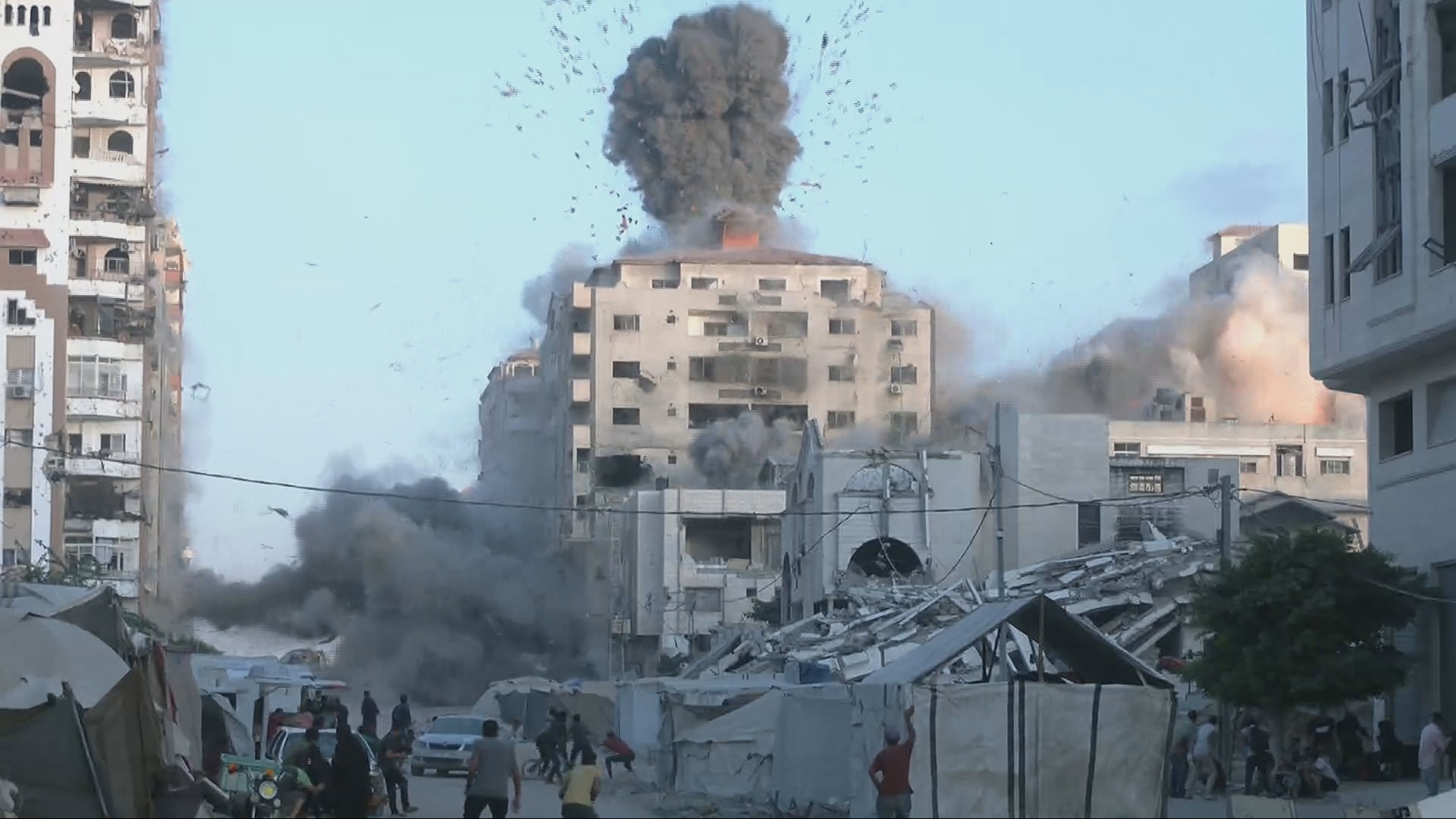 'Video thumbnail for Israeli army hits high-rise building in Gaza City after issuing forced evacuation orders'