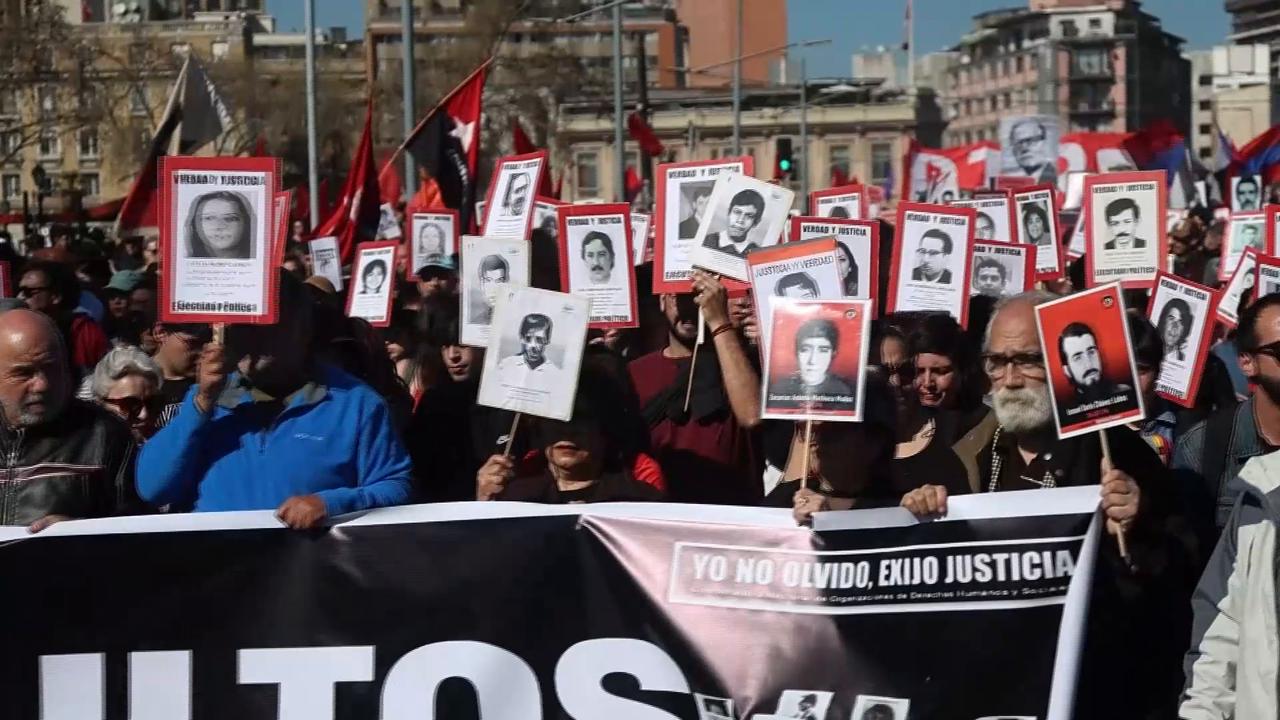 Video thumbnail for Chile: March held in Chile ahead of 53rd anniversary of military coup.