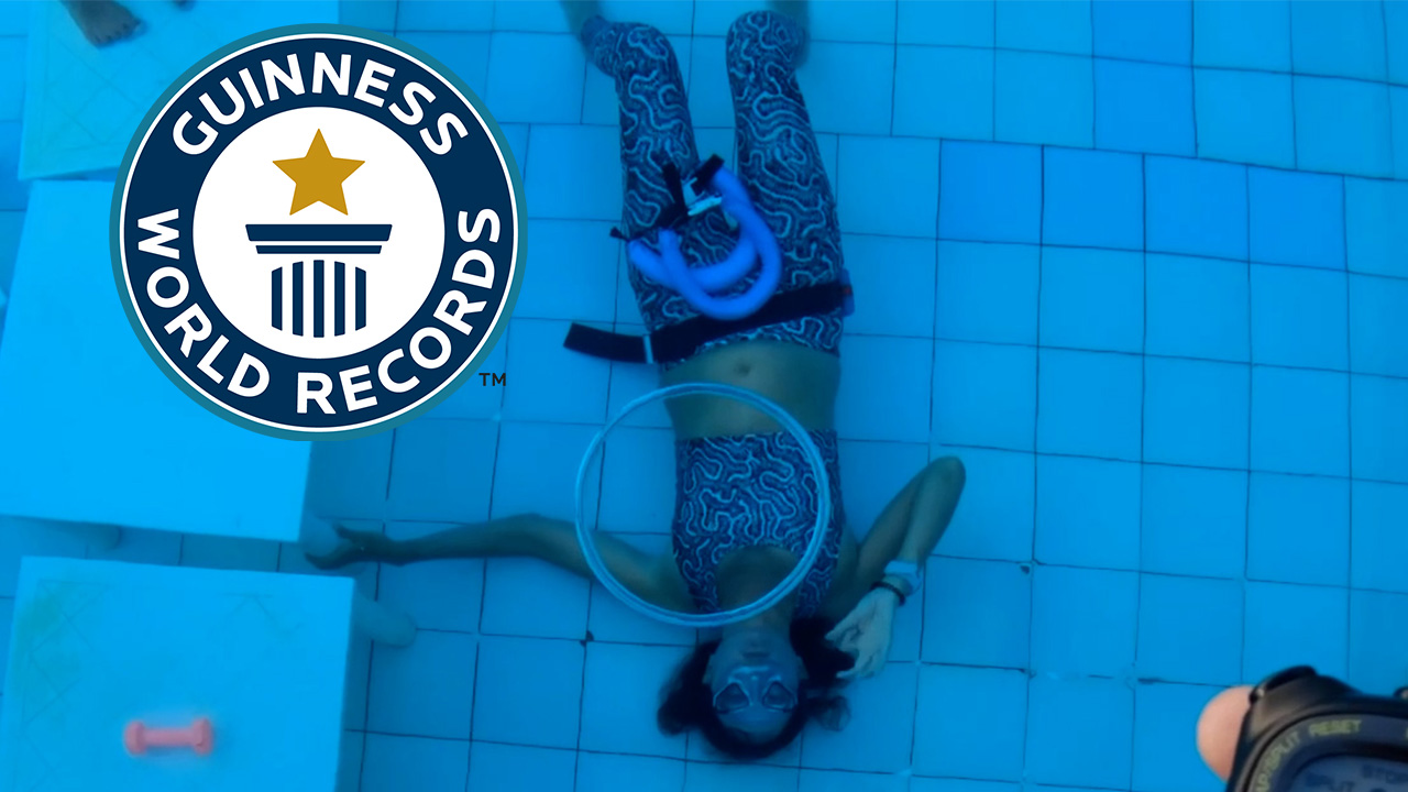 'Video thumbnail for Amelia sets world record by blowing most air rings underwater'
