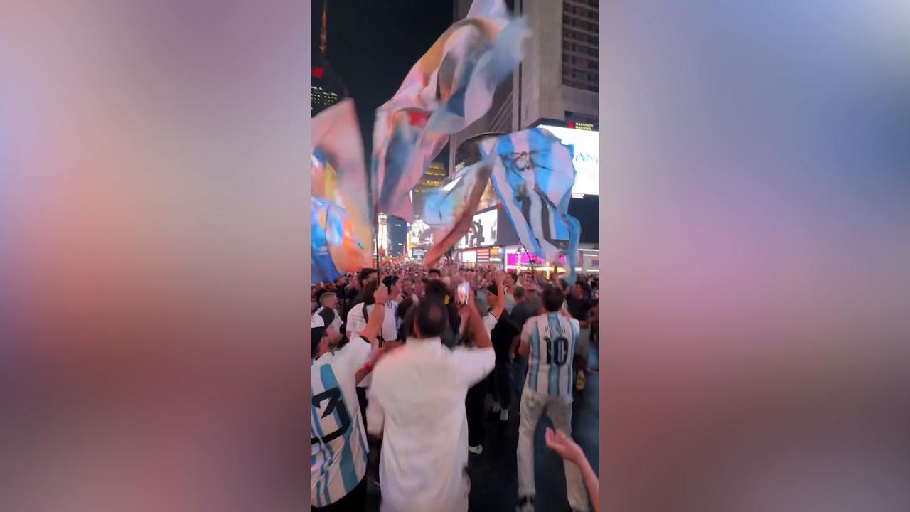 Video thumbnail for US: Argentina fans gather in Times Square ahead of World Cup final.