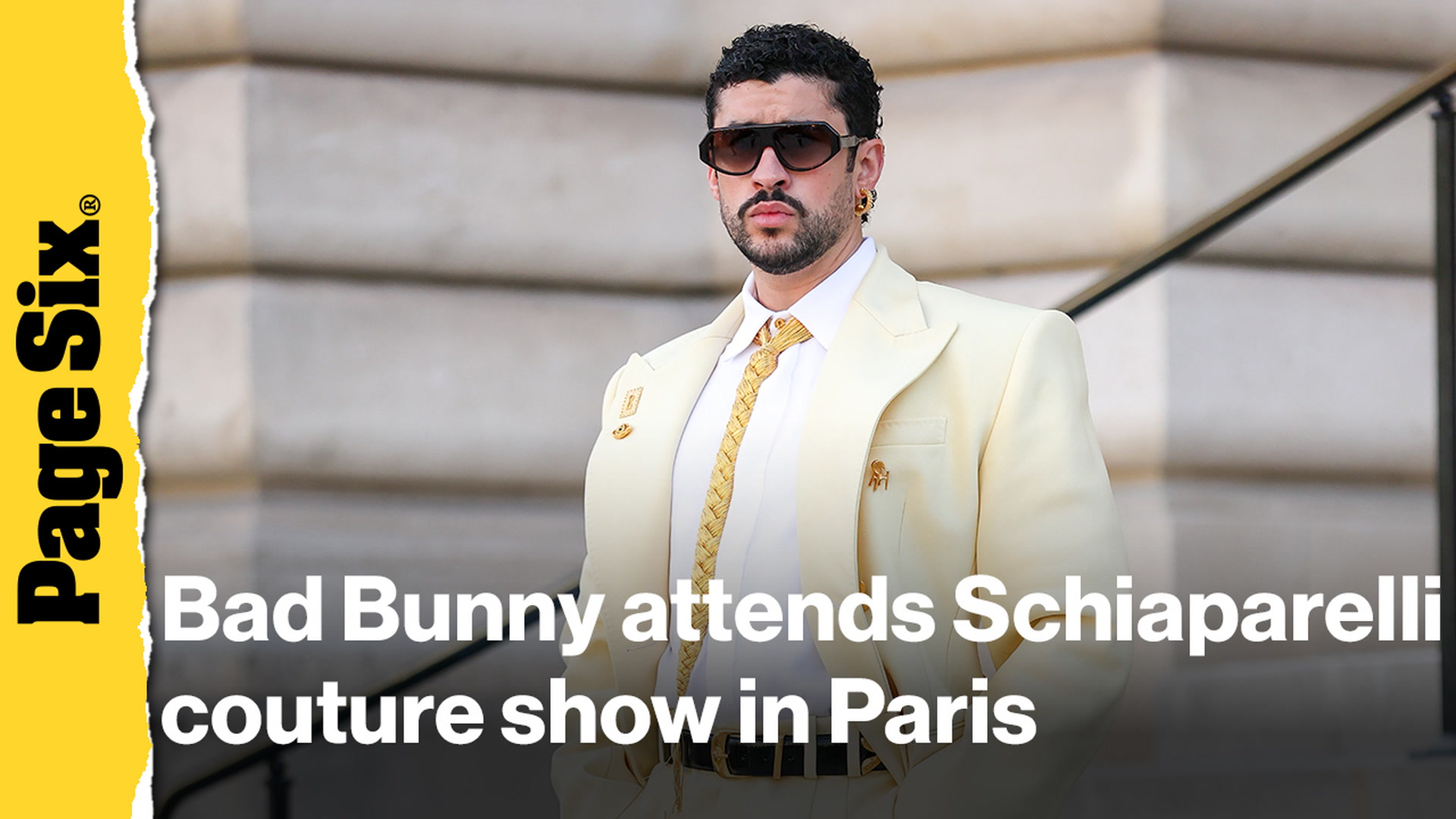 Video thumbnail for Bad Bunny attends Schiaparelli couture show in Paris in butter yellow suit
