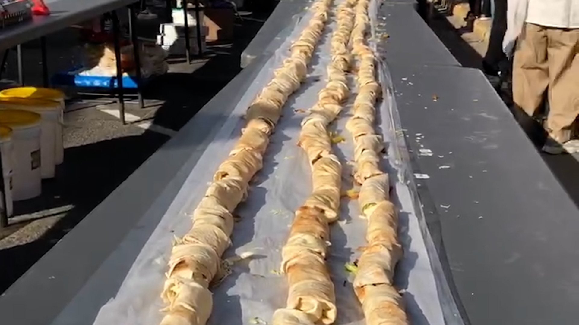 Video thumbnail for Longest line of shawarma wraps - 2,451 wraps by Shawarma Palace and shawarmafest.ca