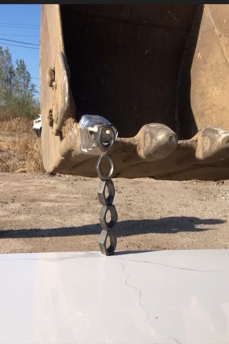 Video thumbnail for Fastest time to stack five hex nuts in an excavator - 1 minute 26 seconds by LV Ping