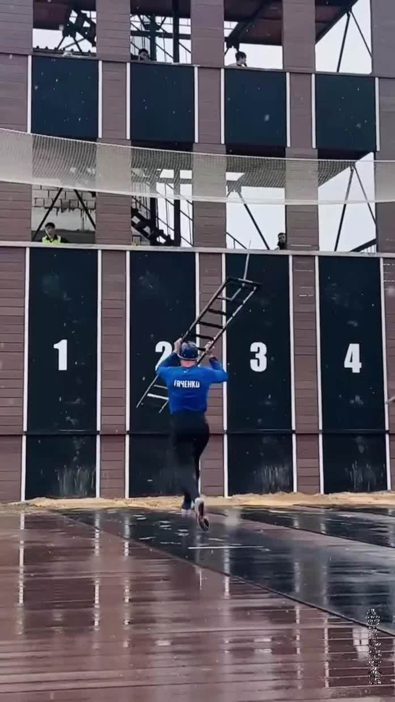Video thumbnail for Firefighter Sport Athletes Racing Up a Tower with Ladders