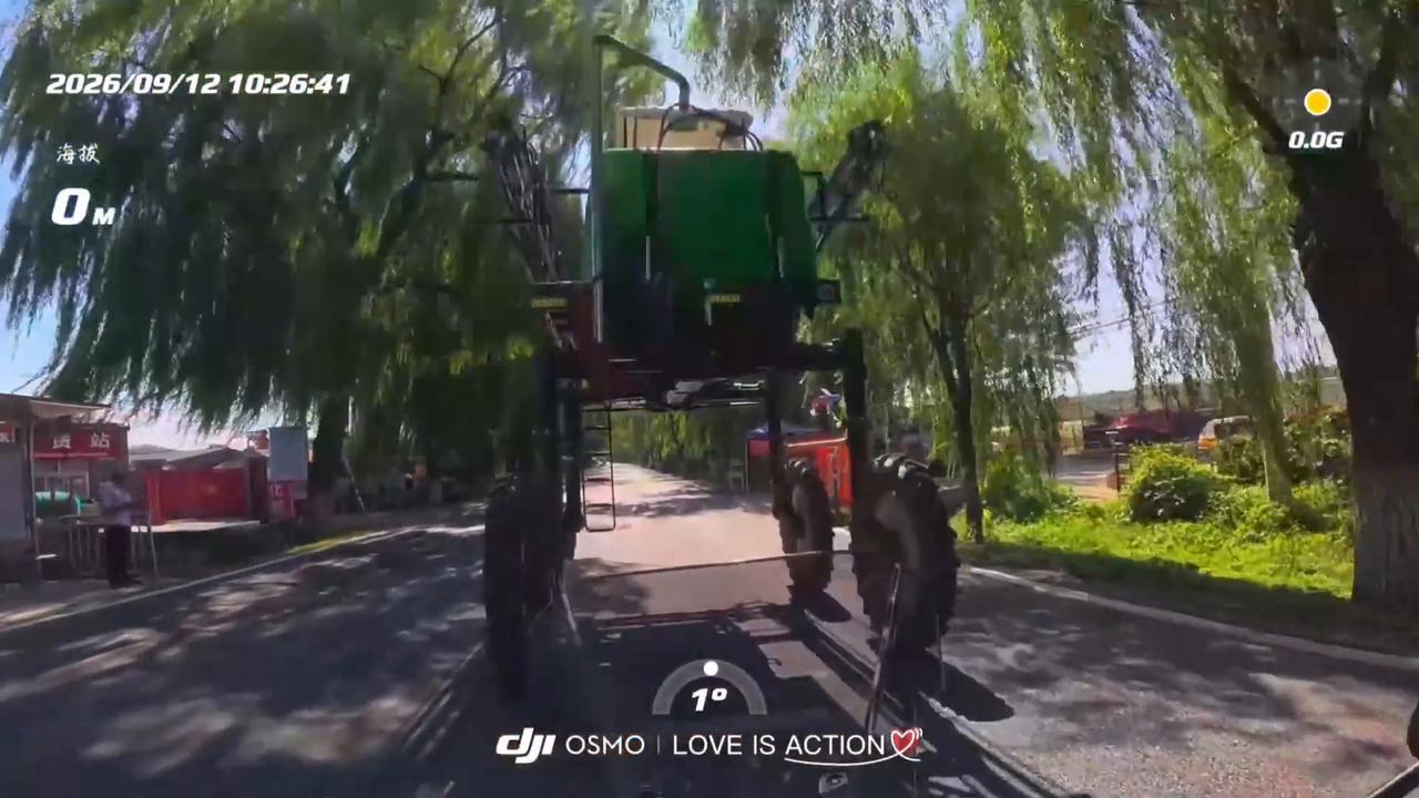 Video thumbnail for China: Motorcyclist rides straight beneath high clearance trailer in China.