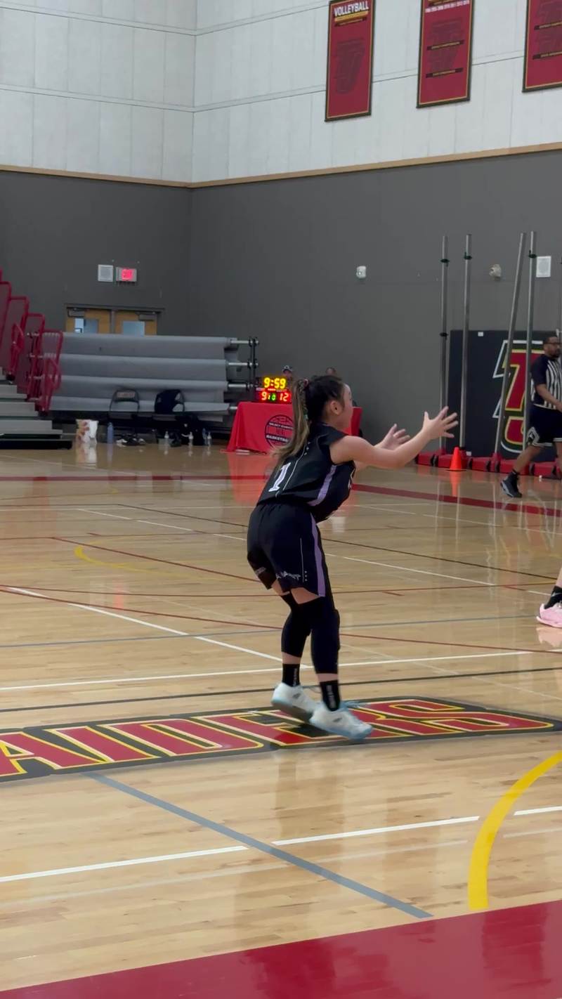 Video thumbnail for Point Guard Slices through Taller Defenders for Left Hand Finish