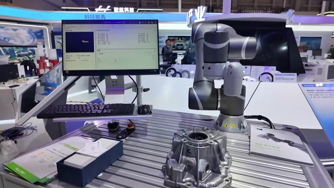 Video thumbnail for China: AI-powered manufacturing takes center stage at western China trade fair.