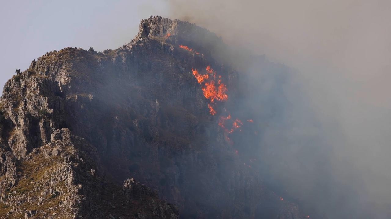 Video thumbnail for Italy: Sicily battles wildfires as blazes threaten residential areas.