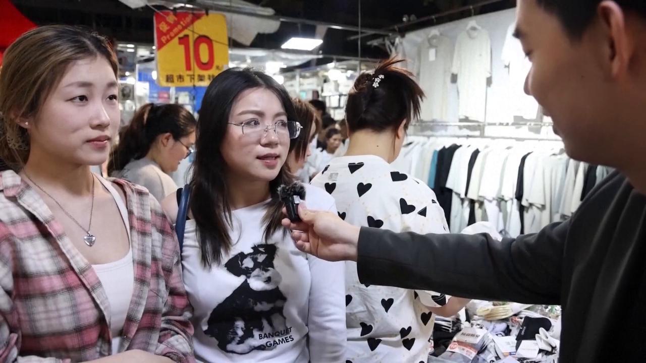 Video thumbnail for China: Night market in China's small commodities hub shines with global flair.