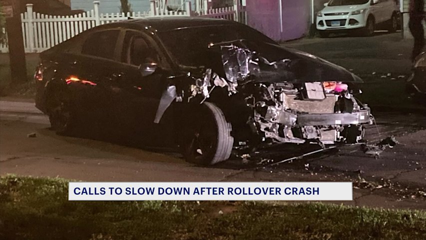 Video thumbnail for Car crashes and rolls over, striking parked vehicle in Bridgeport