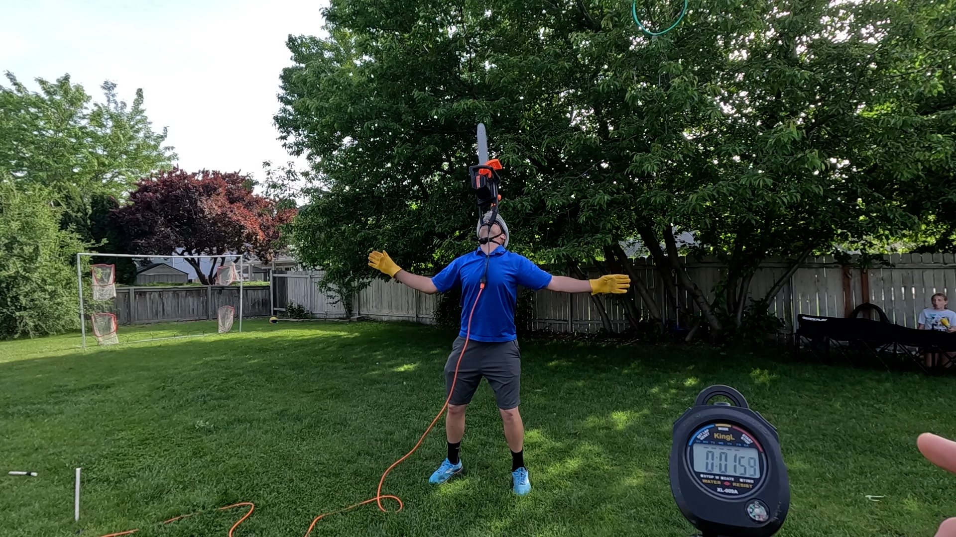 Video thumbnail for Longest duration balancing a running chainsaw on the chin
