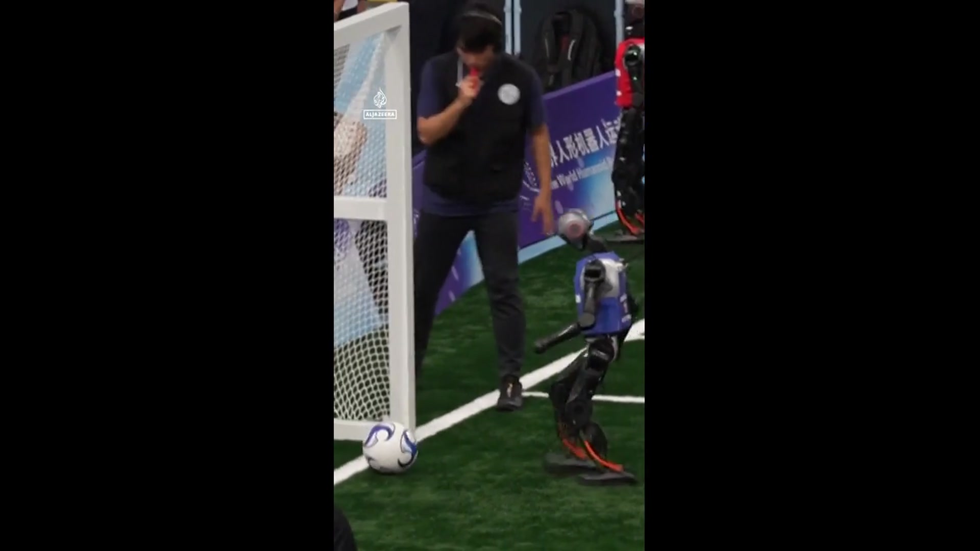 'Video thumbnail for Robots sprint, box and play football at first World Humanoid Games'