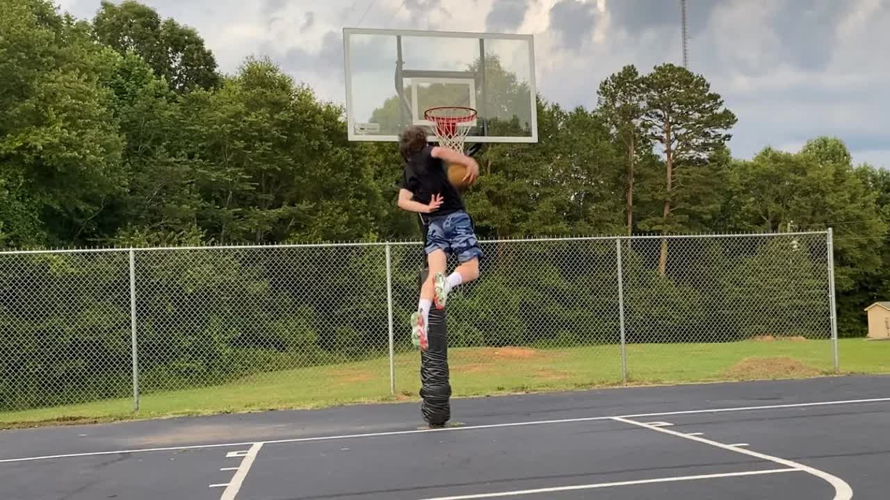 Video thumbnail for Travis Reynolds: Nailing Behind The Back Dunks!