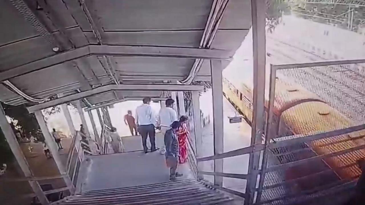 Video thumbnail for India: Heart-stopping rescue unfolds as officials pull female passenger away from approaching moving train just in time.