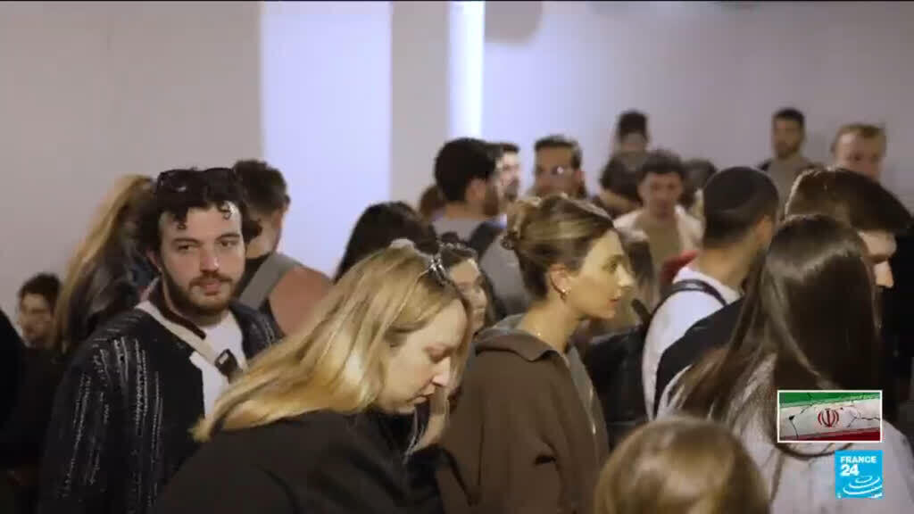 Video thumbnail for In Israel, daily life under missile warnings and wartime restrictions