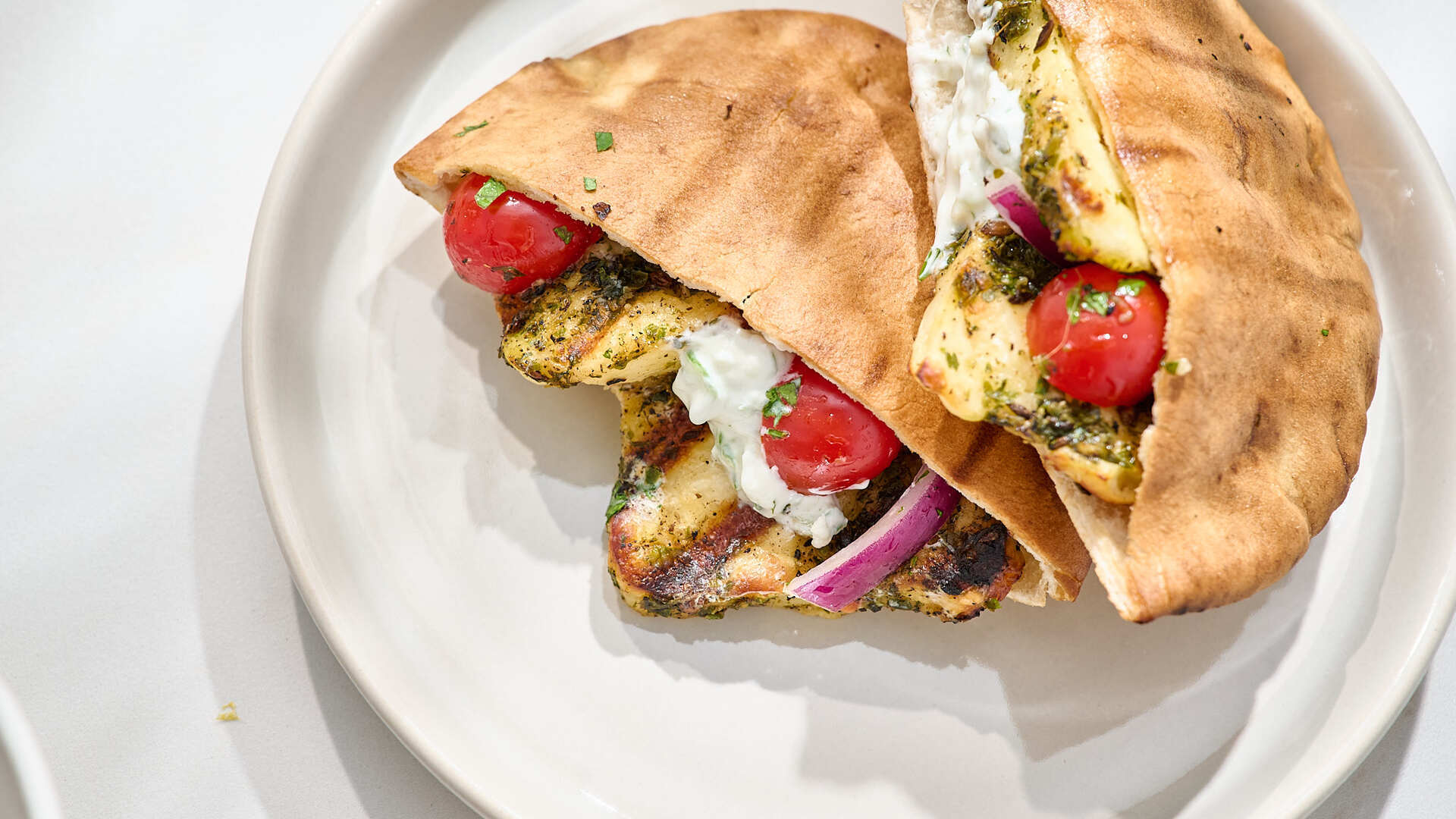 Video thumbnail for Grilled Zhug-Marinated Halloumi Pitas Recipe
