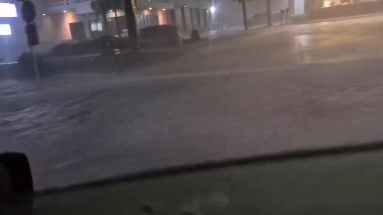 Video thumbnail for US: Cars Navigate Flooded Streets as Heavy Rain and Strong Winds Batter Florida After Hurricane Isaias.