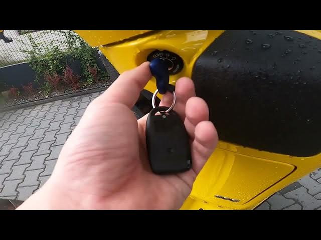 Video thumbnail for How to Open Seat in Vespa GTS ( 2005 - now ) | Enter Helmet Compartment