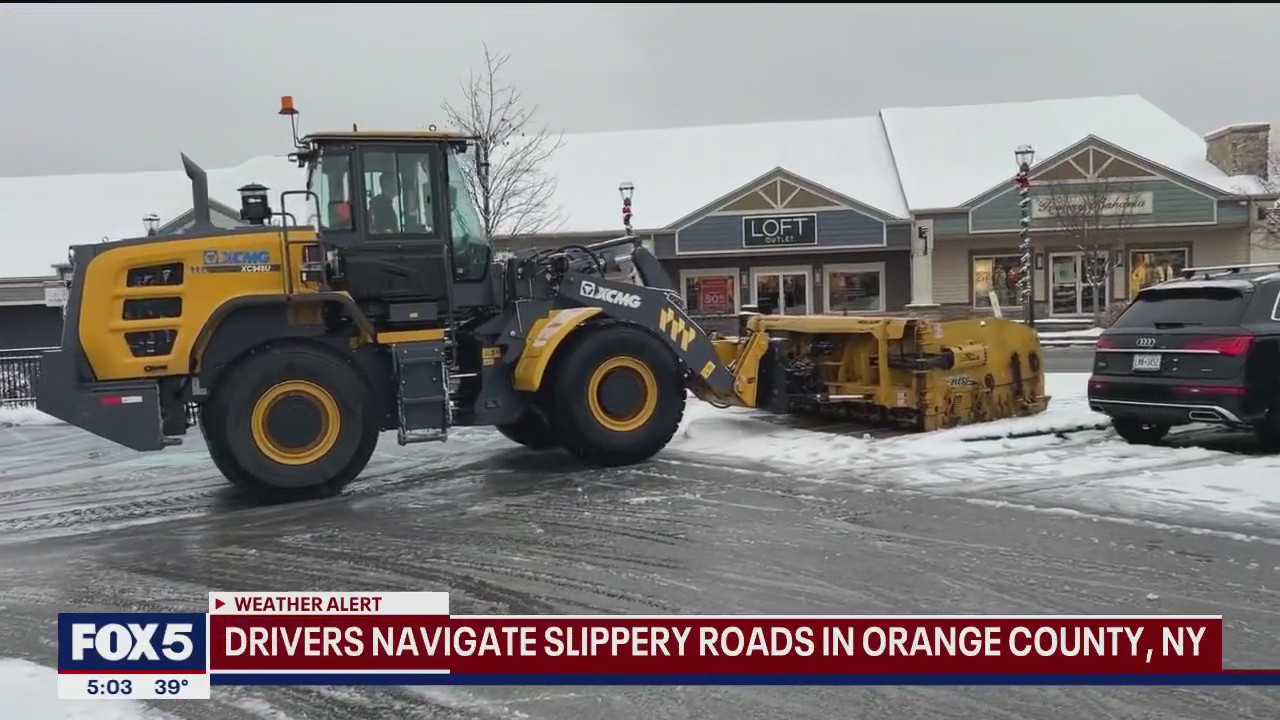 Video thumbnail for Drivers navigate slippery roads in Orange County