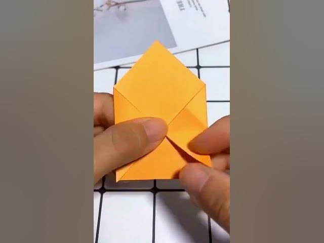 Video thumbnail for How to make a paper kissing Origami mouth #youtubeshorts #shrots