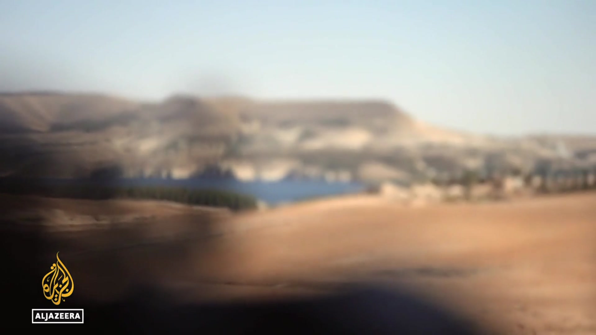 'Video thumbnail for Tensions rise as Syrian forces and Kurdish fighters clash amid fragile ceasefire'