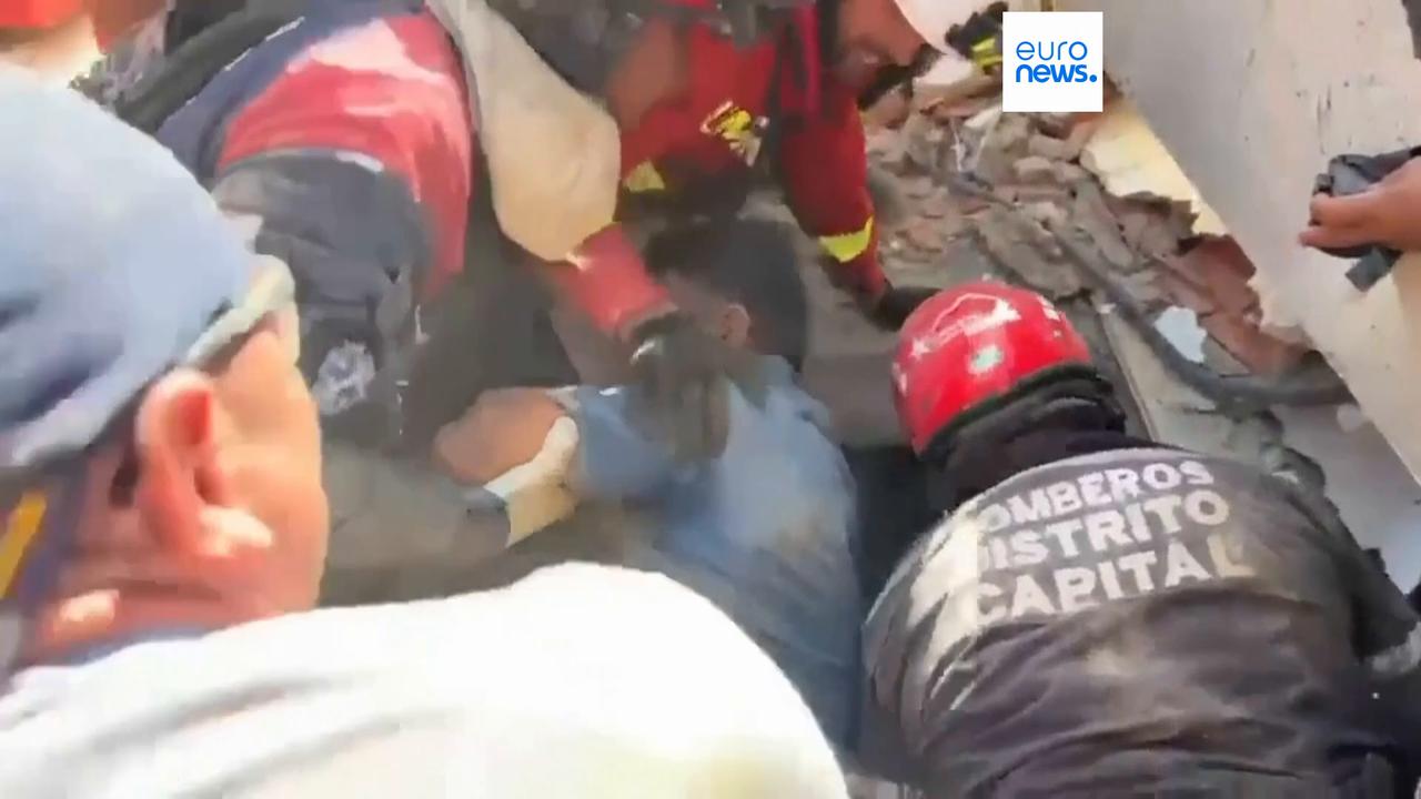 Video thumbnail for Joy as man pulled from rubble three days after Venezuela quake