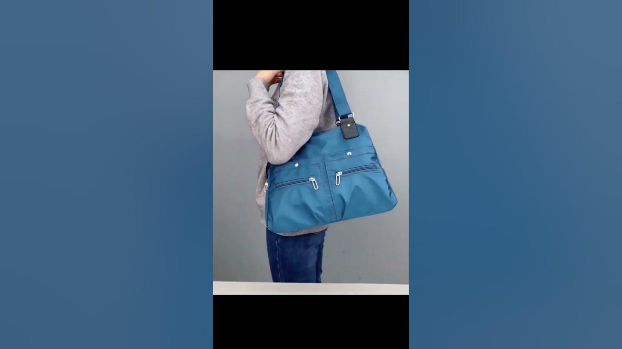 Video thumbnail for 👜 Large Capacity Waterproof Multi-Pocket Shoulder Bag 🌧️ || Link is in Description || #bag #shorts