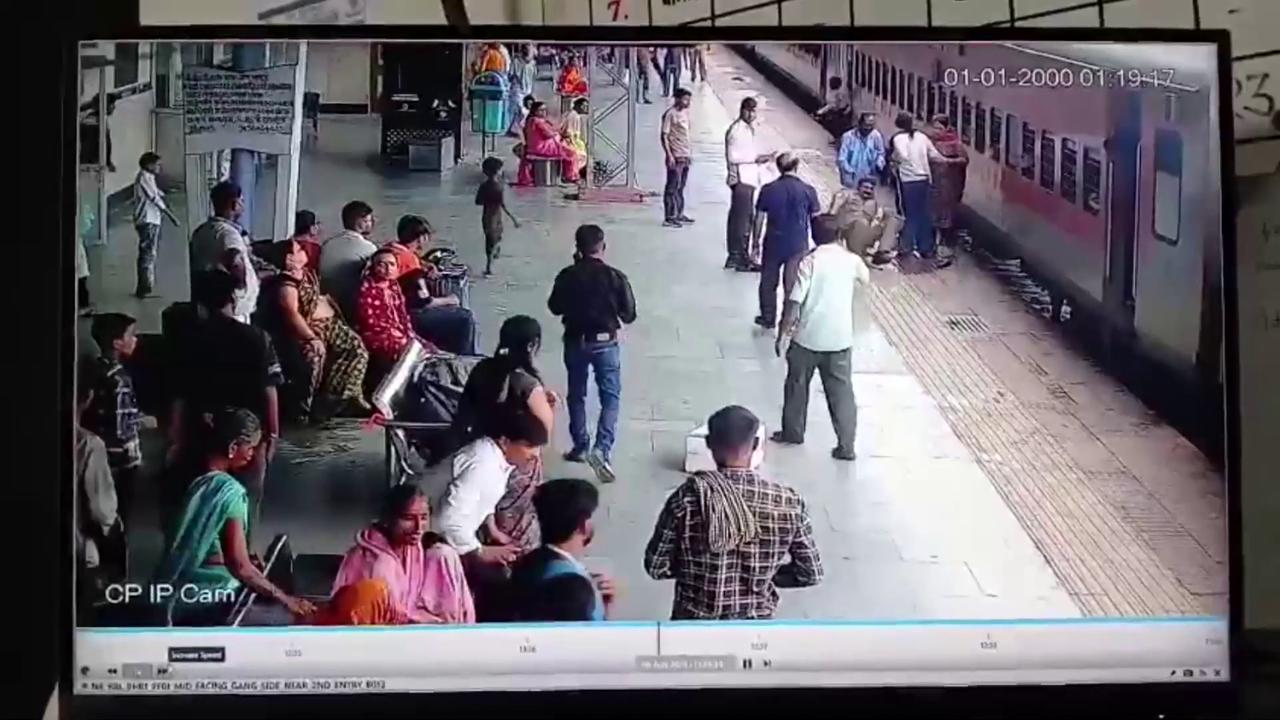 Video thumbnail for India: Quick-thinking official prevents disaster as woman slips from moving train.