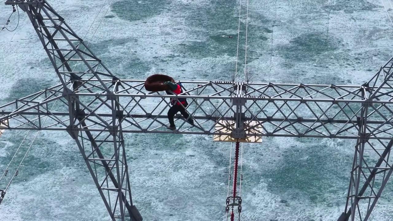 Video thumbnail for China: Drones Install Bird Nests on Power Towers in Altay.