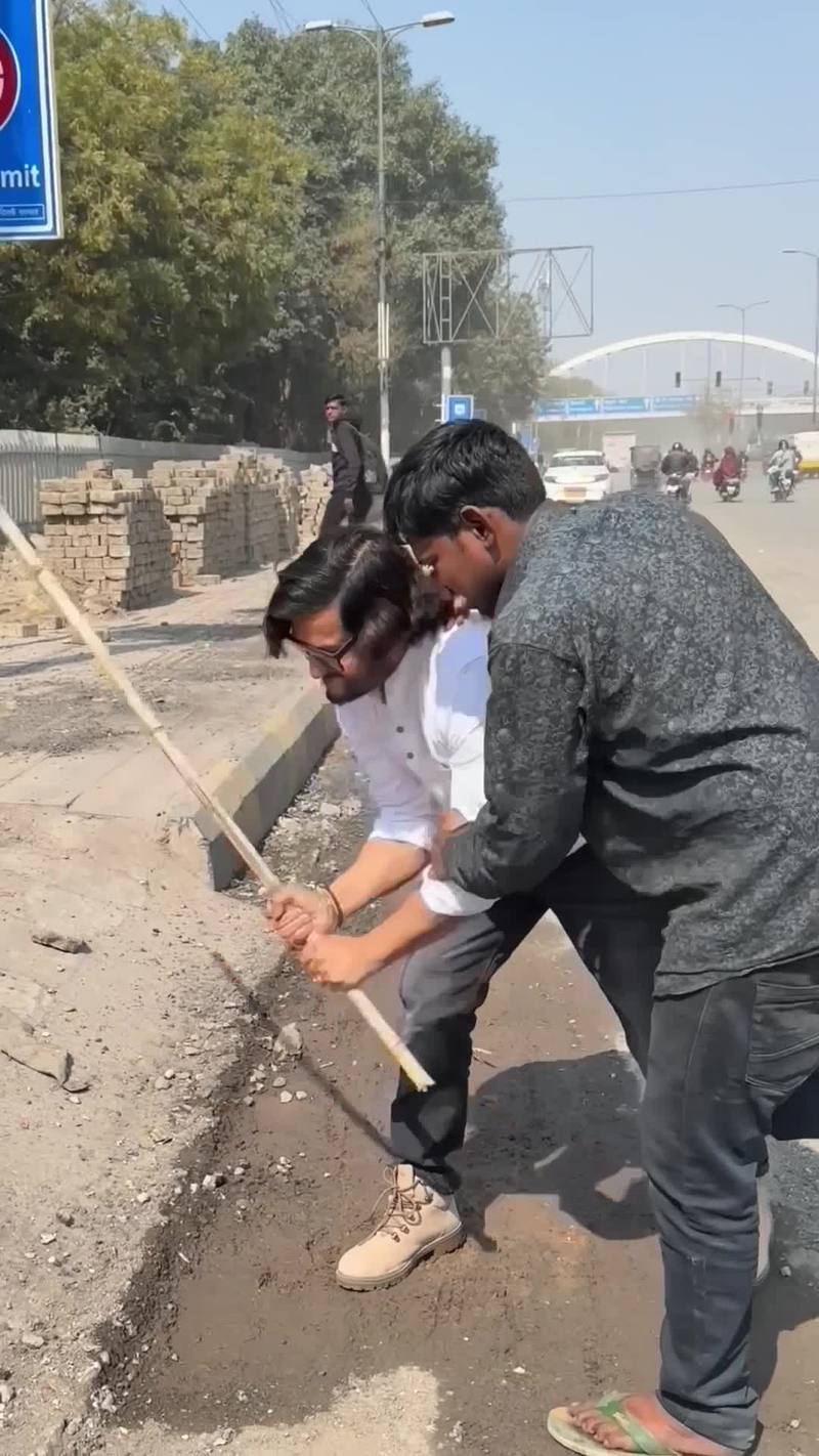 Video thumbnail for Man Helps Disabled Person with Food and Crutches