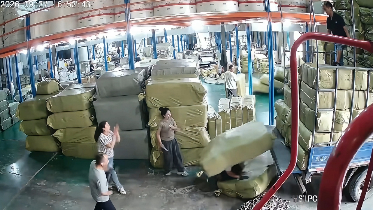 Video thumbnail for Worker Trips as Package Drops on Him at Hebei Warehouse