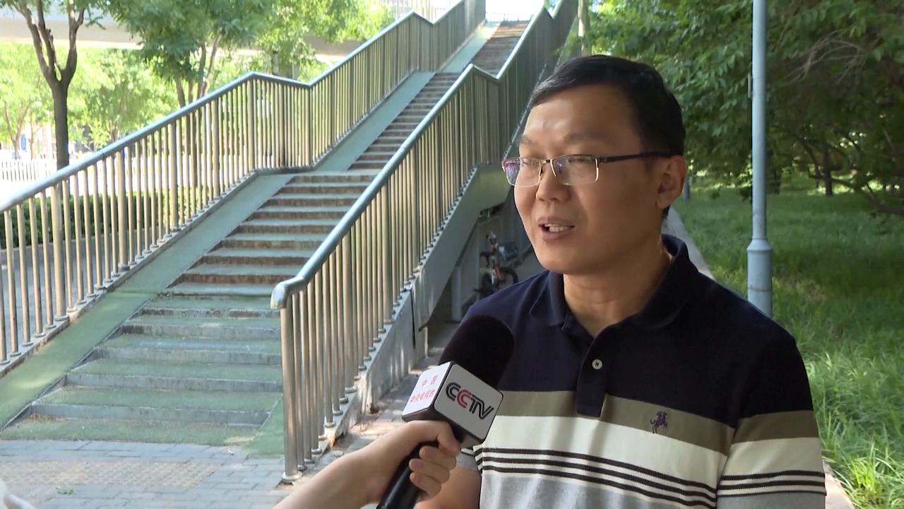Video thumbnail for China: Beijing rolls out smart traffic system to ease congestion, cut delays.
