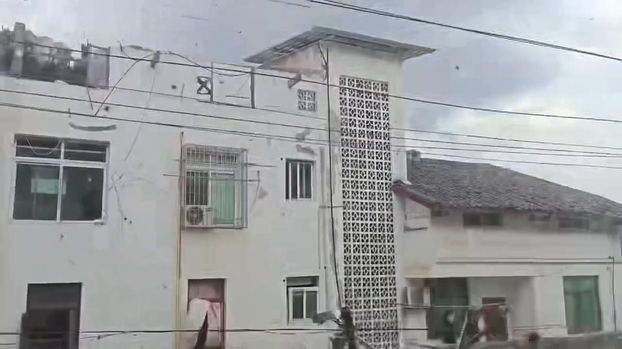 Video thumbnail for China: Chinese village suffers roof damage after typhoon brings powerful winds.