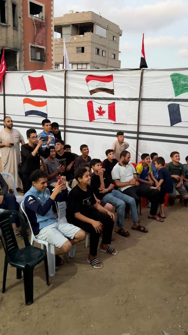 Video thumbnail for Gaza fans chase World Cup joy amid blackout, displacement and war
