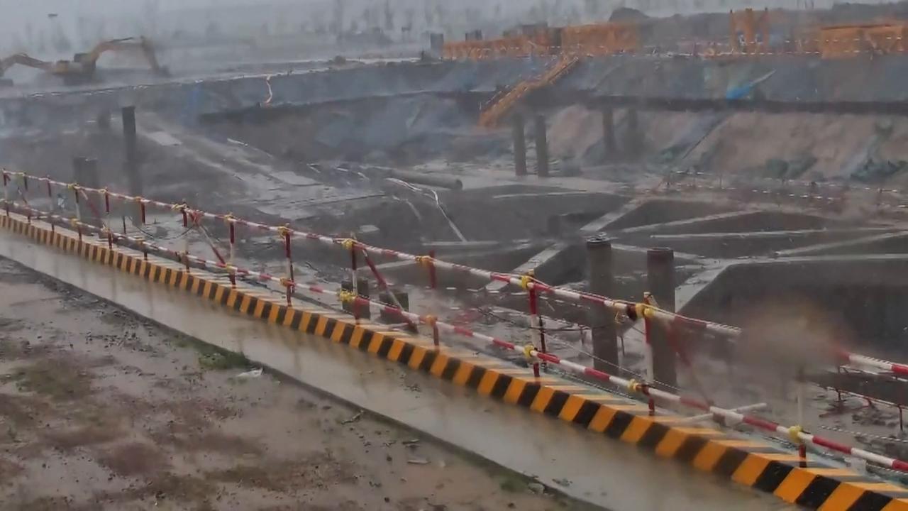 Video thumbnail for China: Cameras record torrential rains in Zhejiang as typhoon approaches east China.