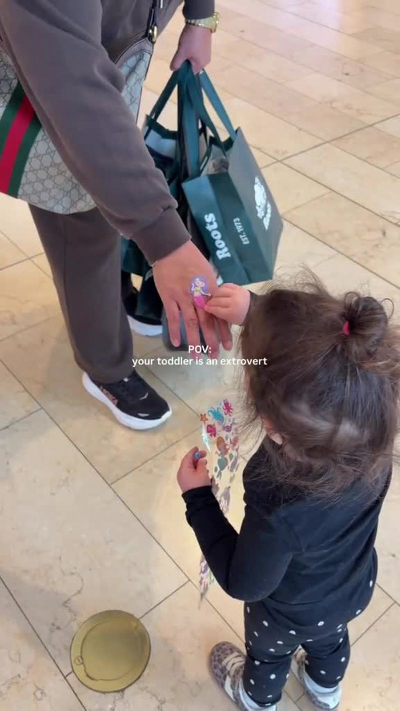 Video thumbnail for Extrovert Toddler Spreads Joy with Stickers at the Mall