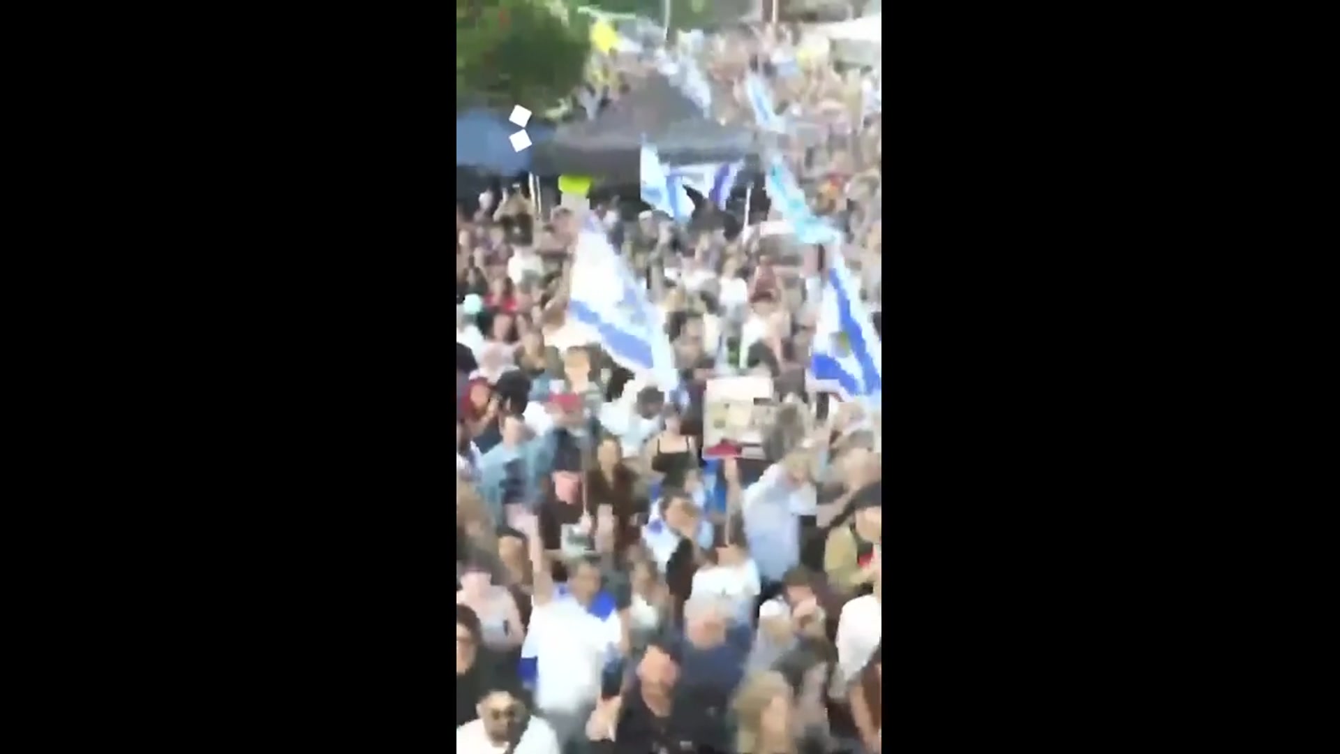 'Video thumbnail for Israelis cheer as Hamas hands first captives over to the Red Cross'