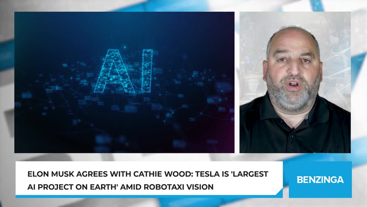 'Video thumbnail for Elon Musk Agrees With Cathie Wood: Tesla Is 'Largest AI Project On Earth' Amid Robotaxi Vision'
