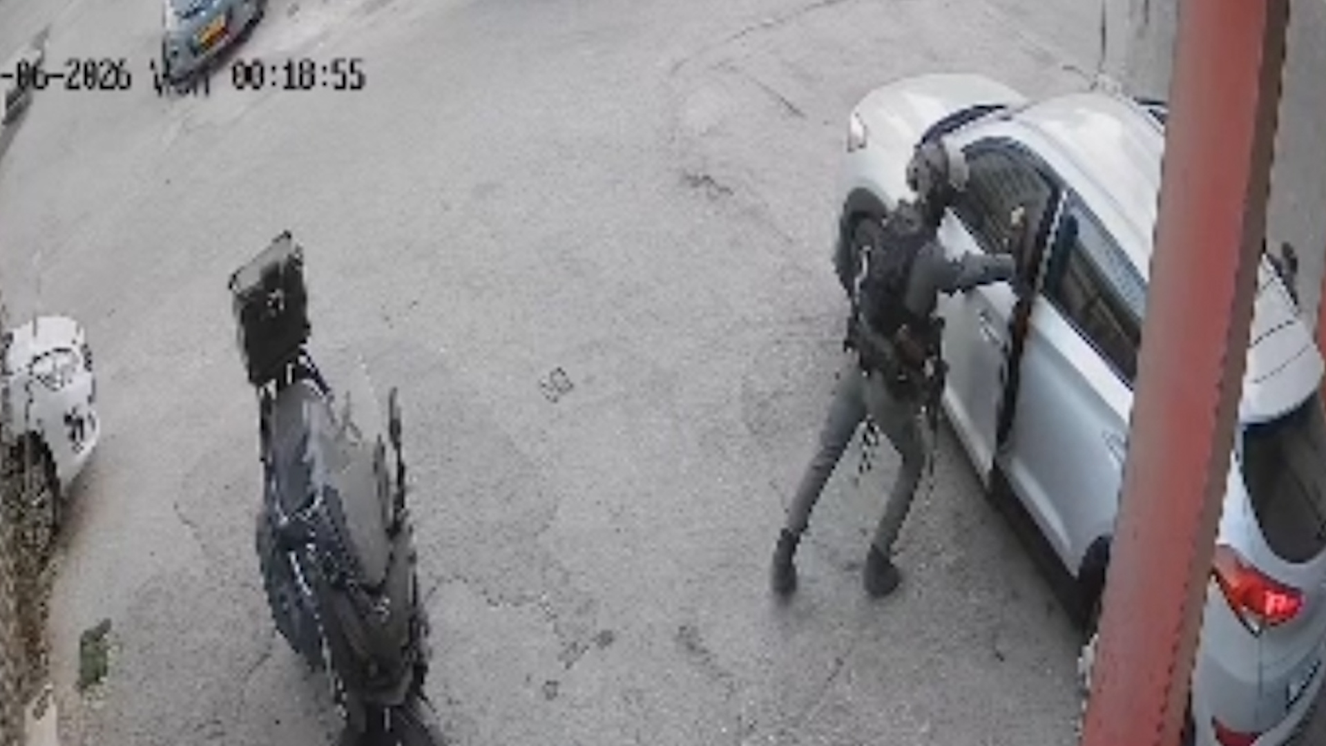 Video thumbnail for Moment Israeli soldier hurls stun grenade into Palestinians’ car