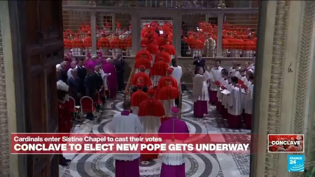 Video thumbnail for Cardinals enter Sistine Chapel to cast their votes